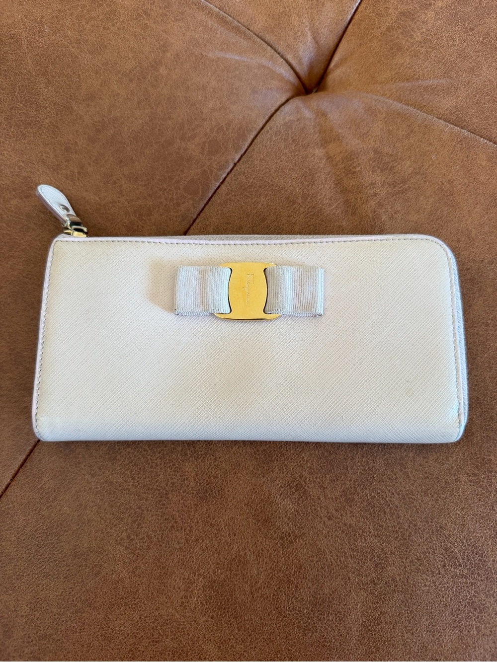Authentic Salvatore Ferragamo Cream Saffiano Leather Vara Bow Zip-Around Wallet